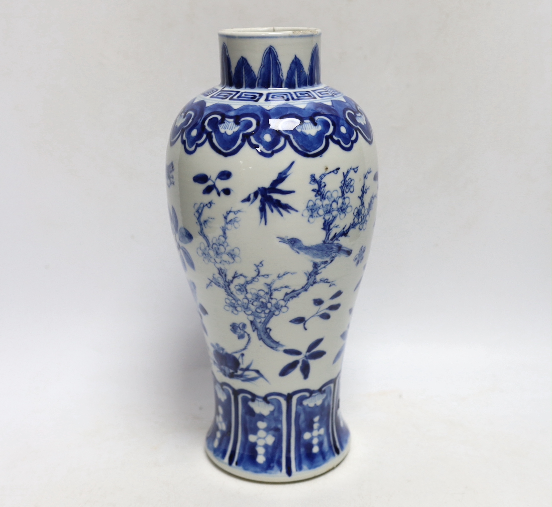 A Chinese blue and white baluster 'blackbirds amid blossom' vase, Kangxi mark, but late 19th century, 27cm